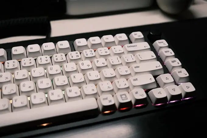 what are the pros and cons of pbt vs abs keycaps